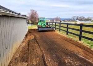 avant tractor skid steer landscaping rake working ground for new garden